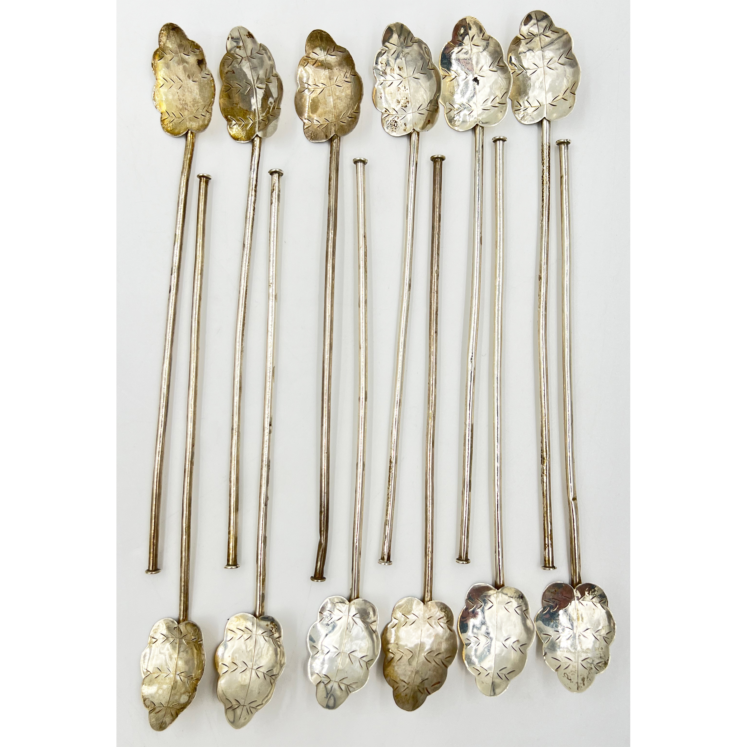 A SET OF 12 CONTINENTAL 925 STERLING SILVER LONG STEMMED SPOONS, COCKTAIL STIRRERS