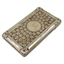 A SILVER CARD CASE WITH FLOWER DECORATION TO THE BODY, BIRMINGHAM, BY HILLIARD AND THOMASON, 1866