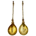 A PAIR OF SILVER GILT APOSTLE SPOONS CARRYING A COMPLETE SET OF CLEAR ENGLISH HALLMARKS, LONDON,1876