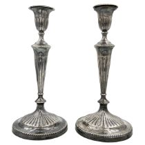 A PAIR OF GEORGIAN SILVER CANDLESTICKS WITH FLUTED DECORATION, SHEFFIELD