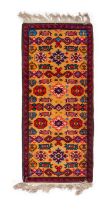A HAND KNOTTED MULTI COLOUR RUNNER RUG, PROBABLY RUSSIAN
