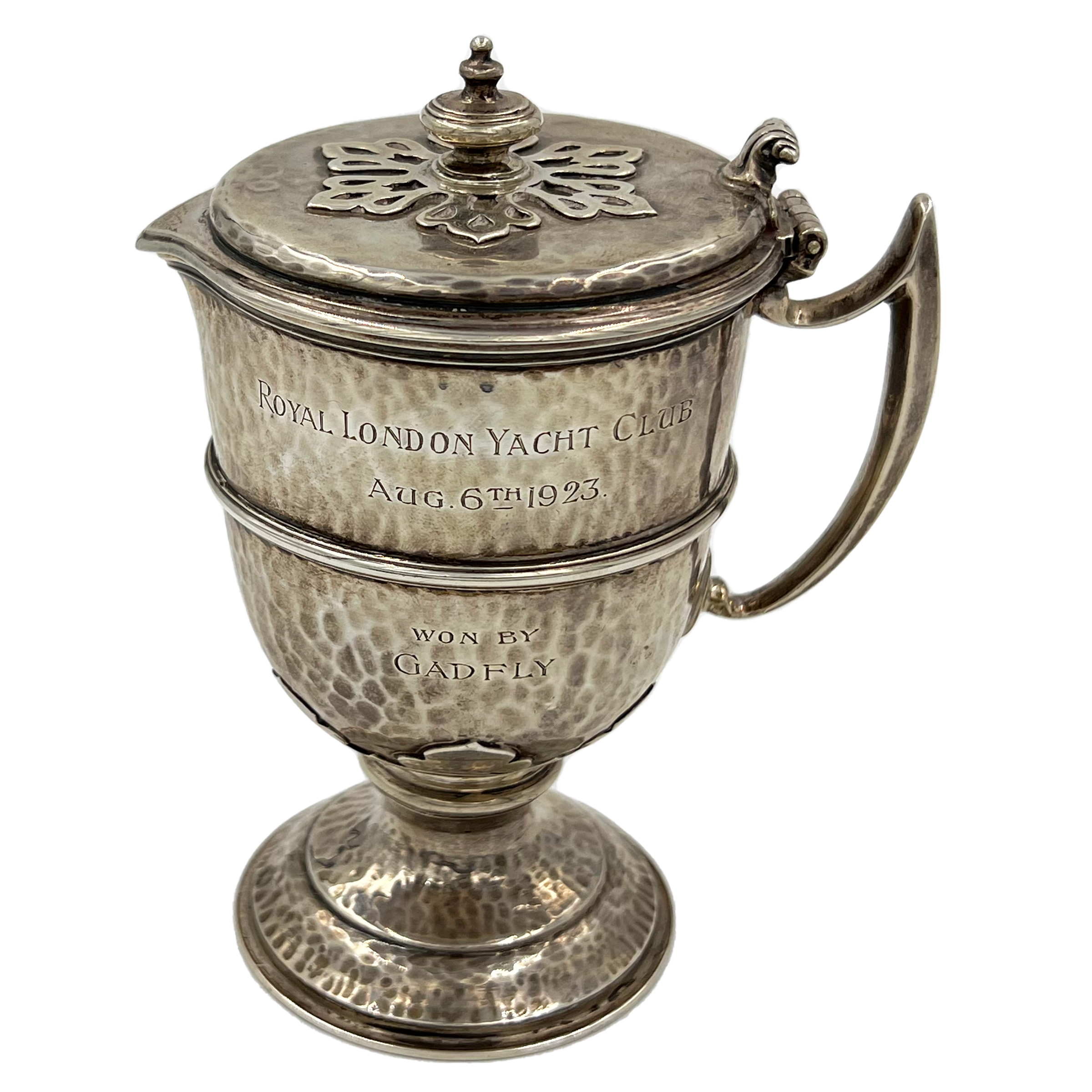 A SMALL VICTORIAN HAMMERED SILVER LIDDED FLAGON WITH A YACHTING INTEREST ENGRAVING