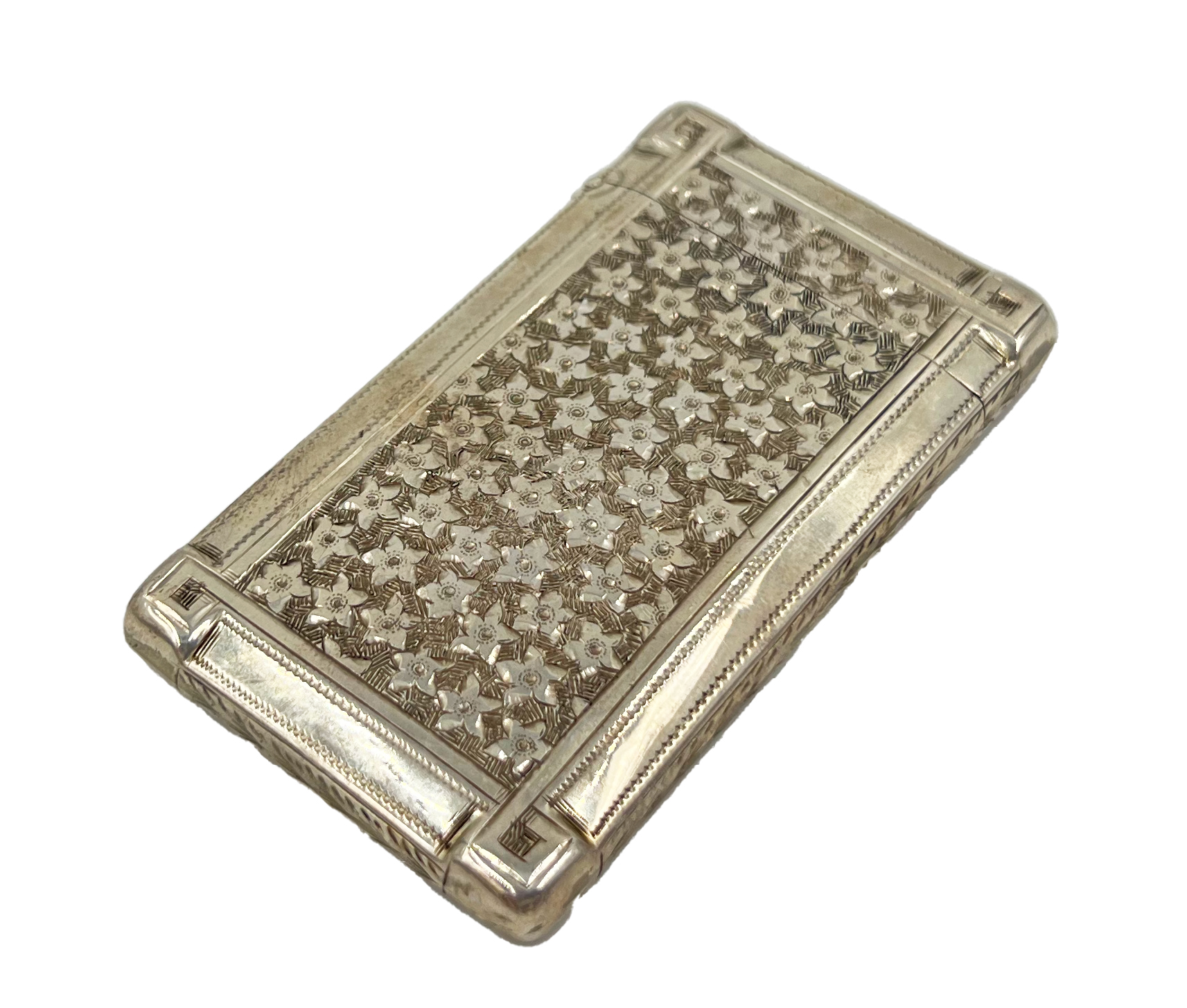 A SILVER CARD CASE WITH FLOWER DECORATION TO THE BODY, BIRMINGHAM, BY HILLIARD AND THOMASON, 1866 - Image 2 of 4