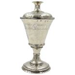 AN IMPORTANT AND RARE ELIZABETH I SILVER COMMUNION CUP AND PATEN, LONDON, 1587