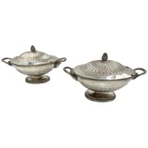 PAIR OF GEORGIAN SILVER LIDDED DISHES WITH ROBBED TWIST RAM HANDLES, LONDON, 1780