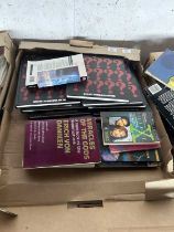 Two trays of mixed books and ephemera, The X Files, Unexplained Mysteries of Space & Time etc