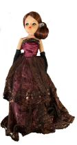 Elegant Ballgown Sindy (Pedigree, 1980s) In burgundy netted dress with sequin details, long black