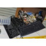 keyboards and mixed items in box