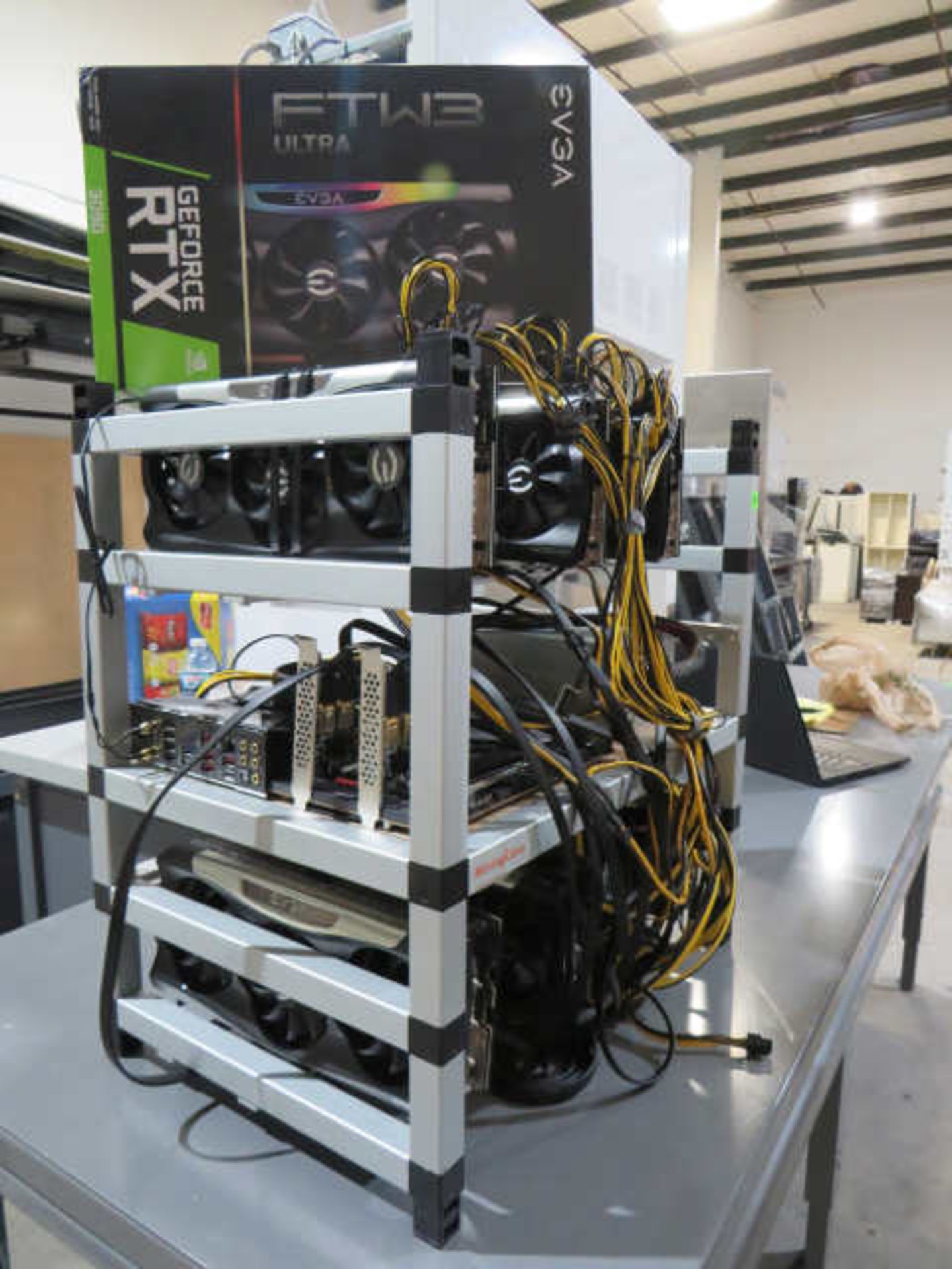 crypto mining rig with 6 Geeforce rtx 3090 graphics cards comes