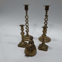 A pair of 19th Century brass spiral twist candlesticks, 31cm high, a smaller pair of brass