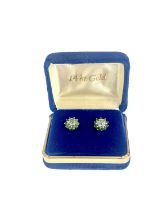 A pair of 14ct gold emerald and diamond cluster stud earrings