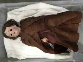 A Schoenau Hoffmeister antique bisque head doll, brown wig, sleeping glass eyes, open mouth, jointed