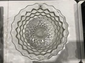 A large pressed glass punchbowl, with moulded tumbling Block decoration, 45cm diameter