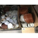 A large collection of Denby, and Buchan pottery tea and dinner ware including plates, dishes, mugs