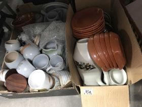 A large collection of Denby, and Buchan pottery tea and dinner ware including plates, dishes, mugs