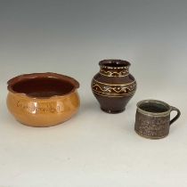 A collection of Ewenny pottery, including a slipware bowl, 22cm diameter, 10cm high, a commemorative