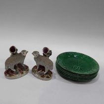 A pair of 19th Century Staffordshire sheep spill vases, shredded clay decoration, 13cm high, and a