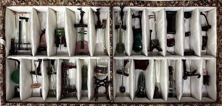 A collection of Chinese carved hardstone and jadeite miniature musical instruments, cased