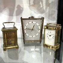 Two traditional brass carriage timepieces, one signed 'J.J. Browne & Sons, the other Saqux .....
