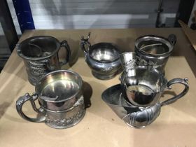 A collection of electroplated shaving mugs including Derby Silver Co Quadruple plate shaving mug,