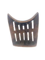 An African Tribal carved wooden headrest, Kambatta, Ethiopia, reticulated trellis design with