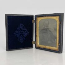 A Union thermoplastic ambrotype case by Samuel Peck & Co, circa 1858, moulded cover scene of Sir