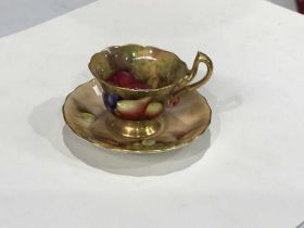 Ayrton and Freeman for Royal Worcester, a fruit painted cabinet cup and saucer, circa 1937,