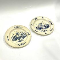 A pair of English creamware plates, circa 1785, possible Staffordshire, blue and white painted