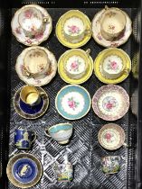 A quantity of English porcelain tea cups and saucers, including Paragon, Hammersley and Carlton