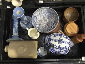 A pair of Wedgwood blue jasperware candlesticks, pillar form on circular foot, impressed marks to