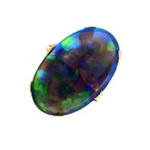 An early 20th century 9ct gold black opal single-stone ring