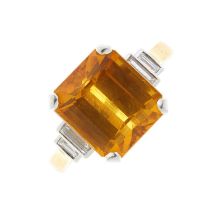 An 18ct gold orange sapphire and diamond ring