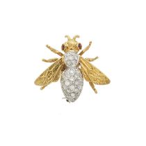 An 18ct bi-colour gold diamond and ruby bee brooch