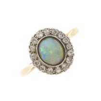 An early 20th century 18ct gold opal and diamond cluster ring