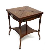 An Edwardian mahogany envelope-action games table, circa 1910, marquetry inlaid, satinwood