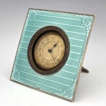 An Art Deco silver and enamelled clock, Charles S Green and Co., Birmingham 1930, square section,
