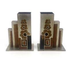 A pair of Art Deco mixed metal vases, in the style of Luc Lanel from his Dinanderie range for