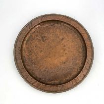 Hugh Wallis, two large Arts and Crafts copper trays, one circular with ropetwist border, the other