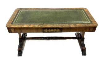 A Regency rosewood library table, circa 1815, gilt-tooled green leather inset top, stylized brass