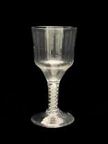 A double series opaque twist large wine glass or goblet, circa 1770, the ogee bowl on a double