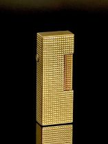 A Dunhill gold plated rollagas lighter, hobnail decoration, in original case with paperwork