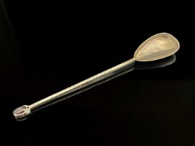 Adrian Harlaar, an Arts and Crafts silver and gem set spoon, planished pear shaped bowl on square