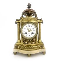 Eug Bagues, Paris, a late 19th Century gilt metal bracket clock, of Baroque design with an urn of