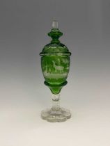 Moser, a Bohemian spa glass pedestal vase and cover, circa 1875, wheel engraved intaglio style