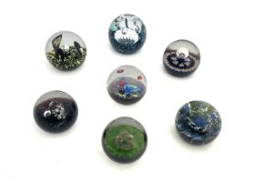 Caithness, seven limited edition paperweights, including elements and planets, Air, Water, Air