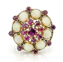 An 18k gold opal and ruby cluster ring, ring size Q 1/2, 5.8g