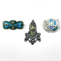 Three Arts and Crafts silver and enamelled brooches and pendant, including Charles Horner and