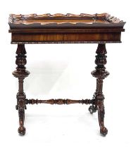 A mid-Victorian mahogany work table, circa 1860, tray top, slender drawers to each end, (lacking the