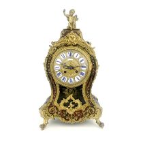 A late 19th Century French boulle work bracket clock, circa 1870, of balloon shape with a cherub