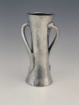 Oliver Baker for Liberty and Co., an Arts and Crafts Tudric pewter vase, model 030, planished
